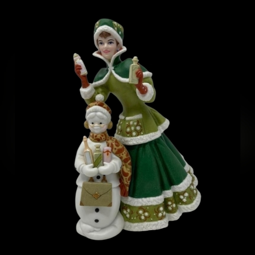 Avon Mrs. Albee President's club Award Holiday figurine from 2003